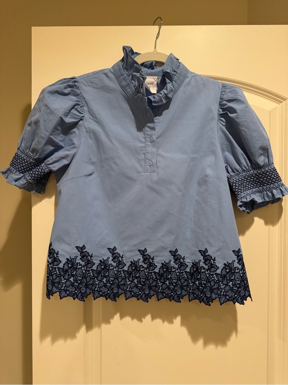 Women’s Light Blue Ruffle Collar Blouse with Navy Floral Hem